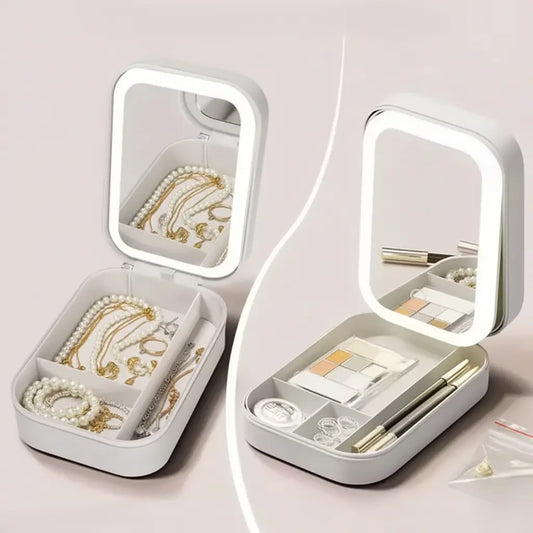 White jewelry and makeup organizer with LED light on a pink background